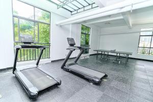 Orchid Residency 2BR, Pool, Gym & balcony views