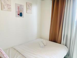 PinkDoorZ MOA Staycation at SEA Residences