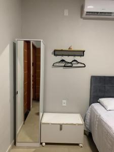 Quarto com ar condicionado e banheiro privativo