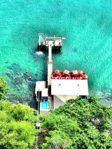 Apart com vista para o mar - píer mahi mahi