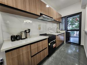 Cozy and homely 2-Bedroom Furnished Suite near Riverside square at Winchester Gardens Riverside Drive