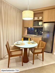 Book Santos Mar, Sol e Conforto no Unique 710 e 810