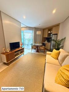 Book Santos Mar, Sol e Conforto no Unique 710 e 810