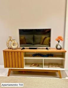 Book Santos Mar, Sol e Conforto no Unique 710 e 810