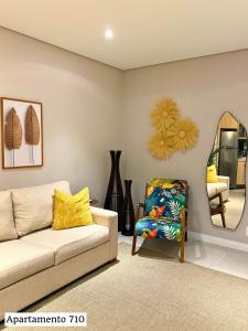 Book Santos Mar, Sol e Conforto no Unique 710 e 810