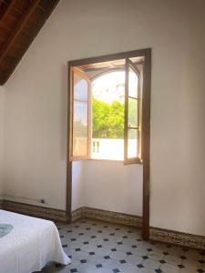Comfortable Room in Historic Casa Quesada Shared House