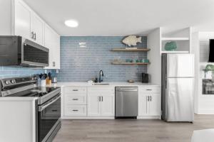 Renovated Beach Front Ocean View Condo TOG 723