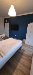 Dreibettzimmer "Blau" in zentraler Lage