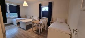 Dreibettzimmer "Blau" in zentraler Lage