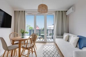 Blue Mandarin Portovo - Apartments near Marina & Amber Sky