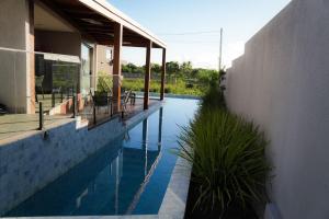 Casa em MilagresAL | 3 suítes, vista-mar, piscina