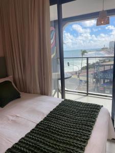 Faroleiro - Studio à beira-mar, com vista para o Farol da Barra, em frente ao circuito do carnaval