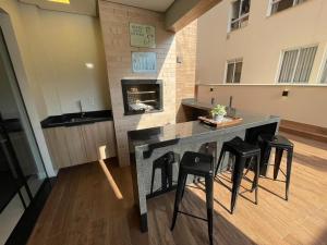 Cód 27 - Apartamento térreo com jacuzzi e área gourmet na Praia de Palmas