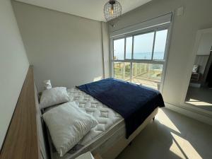 cód 31 - Apartamento 3 dormitórios frente mar