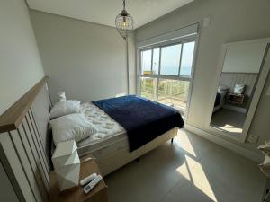 cód 31 - Apartamento 3 dormitórios frente mar