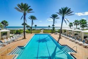 Steps to Beach Palm Coast Escape with Resort Perks!