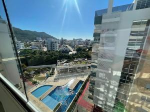 Cód 58 - Apartamento de 2 suítes com piscina.