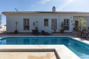 Encantadora villa con piscina y estilo único