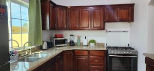 Poolside Serenity Villa Near Airport & Beach