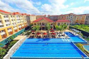 San Remo Oasis at City di Mare, 2-bedroom Condo - Texmex Rm#2316