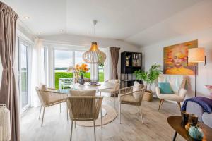 Strandperle Lathum Ferienhaus in Premium Lage am See für Urlaub und Workation mit Hundestrand