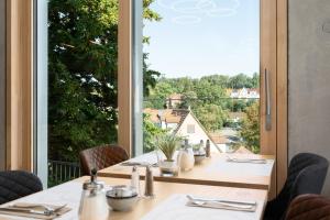 Hotel Bergamo Modern & zentral in Ludwigsburg 24h Check in 3 Min zum Schloss nachhaltiges Hotel in Holzbauweise