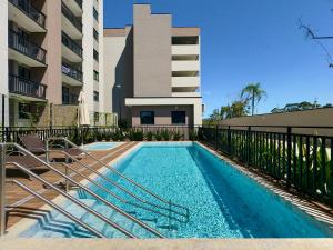 Apto 2 Quartos PISCINA Churrasqueira Wi-Fi Ar Condicionado Cozinha Complata Vaga de Garagem 400m PRAIA Ideal para Famílias ou Amigos Reserve Agora