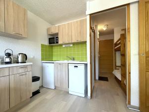 6332 Appartement skis aux pieds Les Menuires