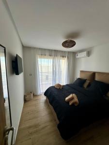 Appartement moderne à Plage des Nations Piscines et terrasse, proche mer