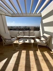 Appartement Plage des Nations Pools and sea 3ch salon