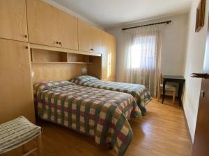 089 Ampio trilocale con doppi servizi, Giustino