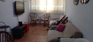 Apto familiar no Guarujá, próximo da Praia das Astúrias