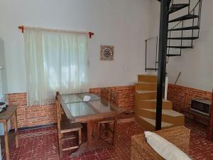 Hermosa casita con patio compartido