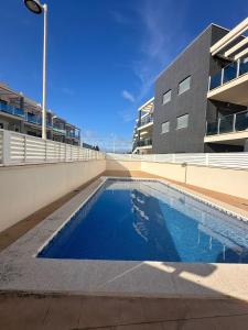 Ground floor apartment on the seafront with pool