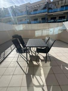 Ground floor apartment on the seafront with pool