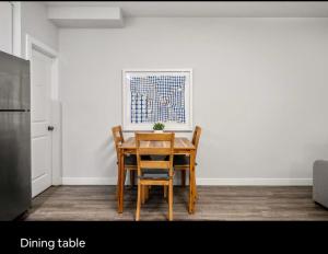 Brand new suite with parking pad at the back