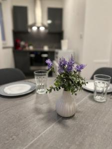 Appartement cosy au cœur du Jura avec place de parking privative