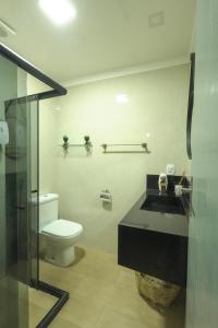 Casa com os pés no mar em Iriri ES