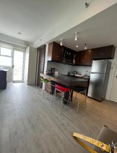 2 BR Seaview Condo At Amaia Steps