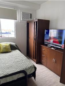 2 BR Seaview Condo At Amaia Steps