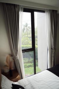 Laguna 1219: Garden View 1BR Oasis