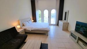 DRUVYA HOLIDAY HOMES, Building No 194, Street No,10 Discovery Gardens, Close to Al Furjan Metro 3 minutes walkable