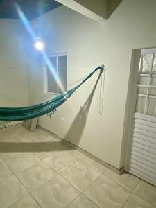 Casa com varanda toda mobiliada