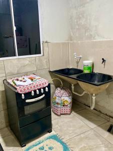 Casa com varanda toda mobiliada