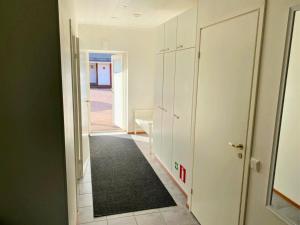 A one-bedroom apartment with a sauna near the center