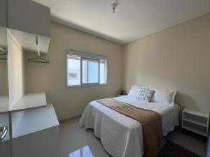 Lindo apto com piscina e churrasqueira a 400m da praia!