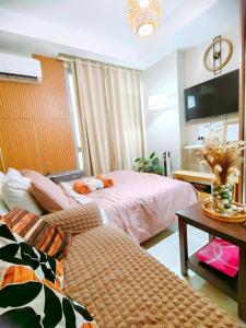 CAMP CJ Staycation A Cozy, Modern Studio near BGC & MRT Boni, Perfect for Relaxing City Getaways