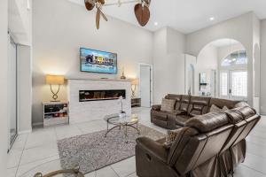 Riverfront Luxury with Heated Pool, Spa & Private Dock - Sunny Shores Escape