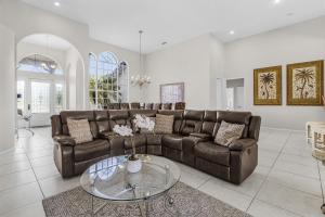 Riverfront Luxury with Heated Pool, Spa & Private Dock - Sunny Shores Escape