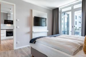 Godewindpark Deluxe-Apartment 1-07 mit West-Loggia